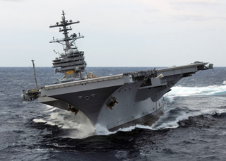 Illustration for article titled The Pentagon's 'Concurrency Myth' Is Now Available In Supercarrier Size